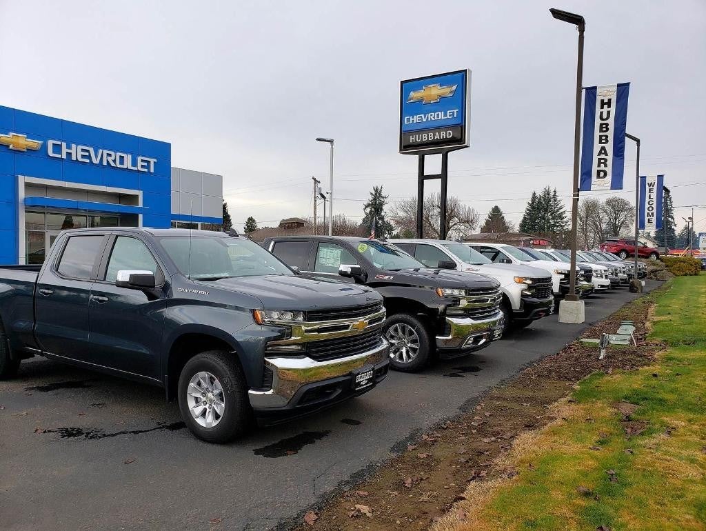 Hubbard Chevrolet dealership building with new and used cars in the lot